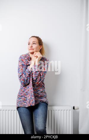 Depressed mid-aged woman at home feeling sad, lonely, anxious (color toned image) Stock Photo