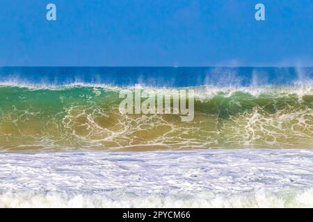 Extremely huge big surfer waves at beach Puerto Escondido Mexico. Stock Photo