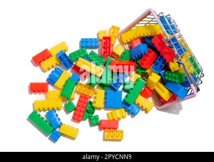 Multi-colored plastic cubes of a children's designer on a white isolated background Stock Photo
