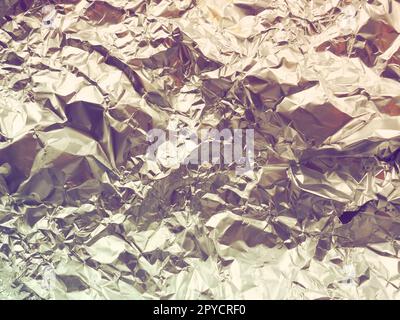 Close up liquid luxury gold metallic glitter paint swirls to make an  abstract textured background Stock Photo - Alamy