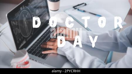 Dentist doctor or nurse in uniform use oral software teeth Xray and typing information medical Stock Photo
