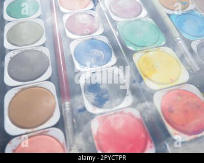 Multi color paint containers Stock Photo - Alamy