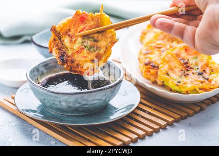 Korean vegetable pancakes with dipping sauce, Korean pizza - Asian food style Stock Photo