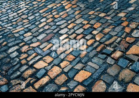 The pavement of granite stone. Paved roadway street, texture, background Stock Photo