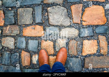 The pavement of granite stone. Paved roadway street, texture, background Stock Photo