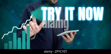 Sign displaying Try It Now. Word for Free trial of something new experiment different things Stock Photo