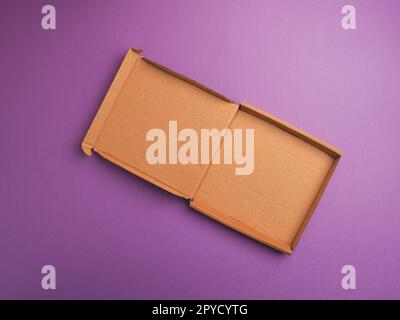 Eco friendly pizza box on a purple studio background Stock Photo