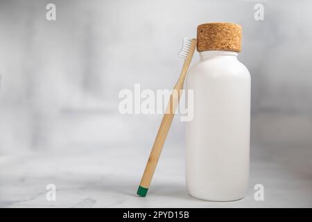 Eco friendly sustainable water bottle No plastic, Zero Waste, Sustainable Lifestyle. Choice Plastic Free Items alternative to disposable. Crumpled plastic bottle and glass bottle on pastel blue background. copy space Stock Photo