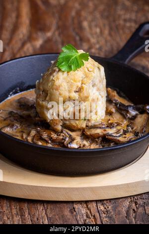 bread dumpling in mushroom sauce Stock Photo