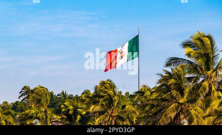 Mexican green white red flag in Zicatela Puerto Escondido Mexico. Stock Photo