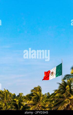 Mexican green white red flag in Zicatela Puerto Escondido Mexico. Stock Photo