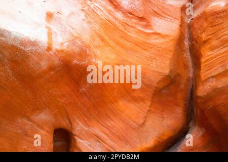 Brown sand-colored stone tiles on the wall Stock Photo