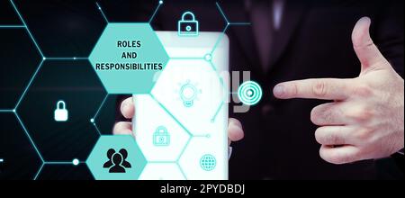 Text sign showing Roles And Responsibilities. Word for Business functions and professional duties Stock Photo