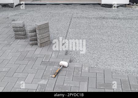 construction of a sidewalk made of concrete blocks, copy space Stock Photo