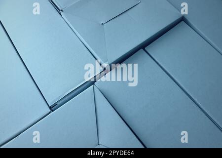 Cardboard boxes seamless pattern on blue background Stock Photo