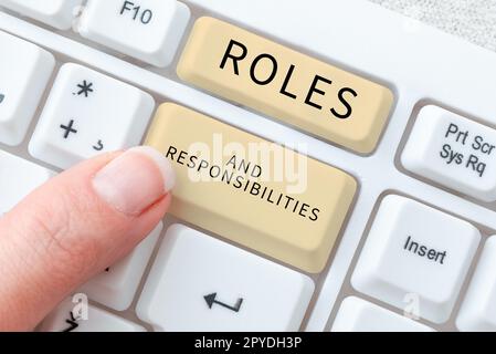 Text sign showing Roles And Responsibilities. Business overview Business functions and professional duties Stock Photo