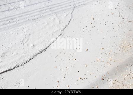White gray mud dirt puddles after rain Holbox island Mexico. Stock Photo