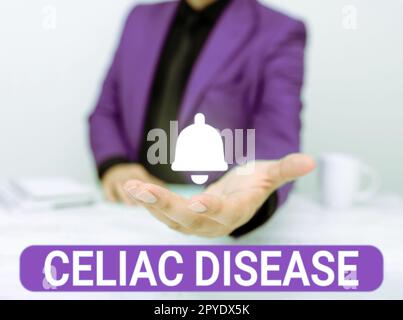 Hand writing sign Celiac Disease. Word Written on Small intestine is hypersensitive to gluten Digestion problem Stock Photo