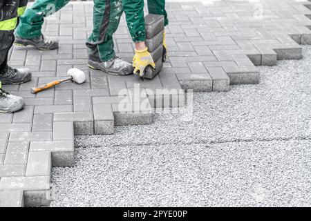 construction of a sidewalk from concrete blocks Stock Photo