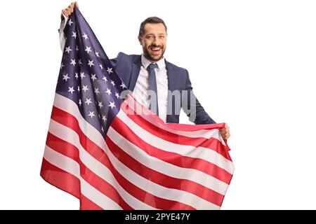 Happy young professional man holding a USA flag isolated on white background Stock Photo
