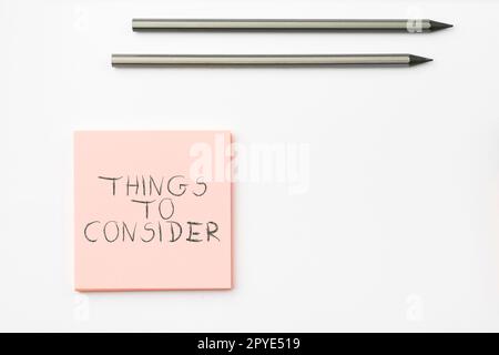 Text sign showing Things To Consider. Business concept list to check or do it Shopping Schedule Time table Stock Photo