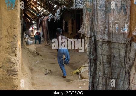Bangladesh, Cox's Bazar. Children play in the streets of the Kutupalong Rohingya Refugee Camp. March 24, 2017. Editorial use only. Stock Photo