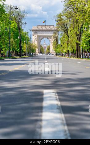 Bucharest, Romania - April 2023: The Arch of Triumph (Arcul de Triumf) in Bucharest is closely modelled after the Arc de Triomphe from Paris. located Stock Photo