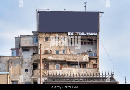 Old communist building with bullet marks or holes from the Romanian Revolution in December 1989 Stock Photo