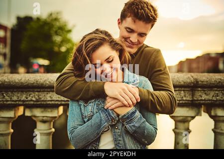 Hes the love of my life. a young couple out on a date in the city. Stock Photo