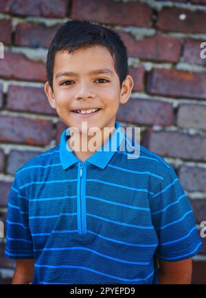 The coolest dude in school. Portrait of an adorable young boy outside. Stock Photo