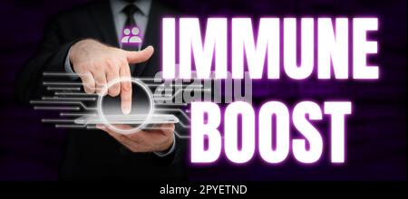 Hand writing sign Immune Boost. Business approach being able to resist a particular disease preventing development of pathogens Stock Photo