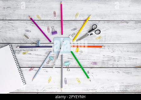 Office supplies for work, sales and study on a wooden background. Stock Photo