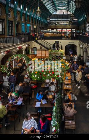 London, UK, Sept 2022, clients sitting at a restaurant in Covent Garden Market Stock Photo