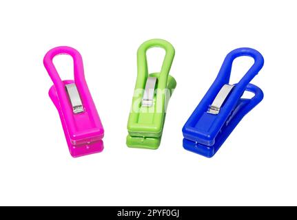 Colored plastic clothespins or clothes peg isolated on white background Stock Photo