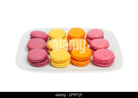 Selection of macarons on a plate isolated against white Stock Photo