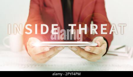 Conceptual display Inside Threat. Word Written on Information that only an insider would have Real information Stock Photo