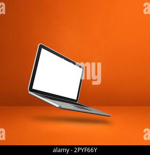 Blank computer laptop floating over an orange background. 3D isolated illustration. Square template Stock Photo