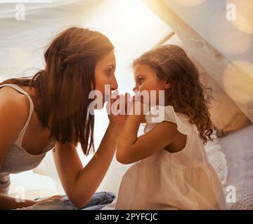 I promise mommy. a mother and daughter coming together and making a pinky swear as a promise to one another. Stock Photo