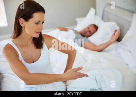 Are you seriously trying to put the blame on me. a mature couple having marital problems at home. Stock Photo