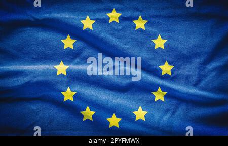 Concept of the fabric flag of the European Union. Flag of European Union painted on cotton fabric. Stock Photo