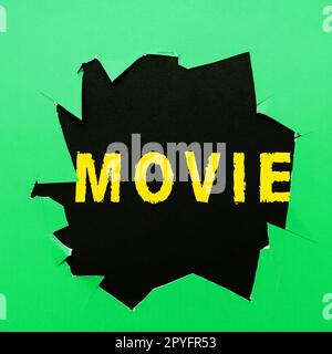 Sign displaying Movie. Word for Cinema or television film Motion picture Video displayed on screen Stock Photo