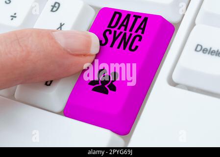 Handwriting text Data Sync. Word for data that is continuously generated by different sources Stock Photo