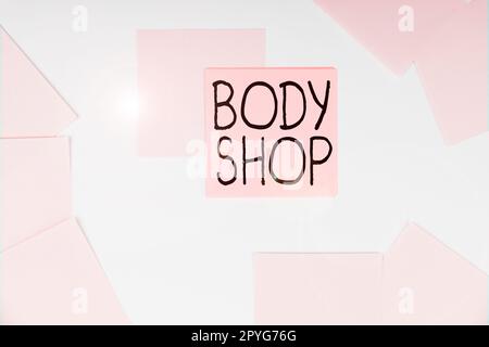 Text showing inspiration Body Shop. Word for a shop where automotive bodies are made or repaired Stock Photo