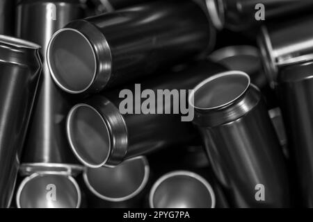 black aluminum drink cans in production Stock Photo