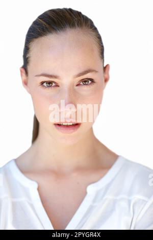 Eye of the tiger. Portrait of an attractive young woman isolated on white. Stock Photo