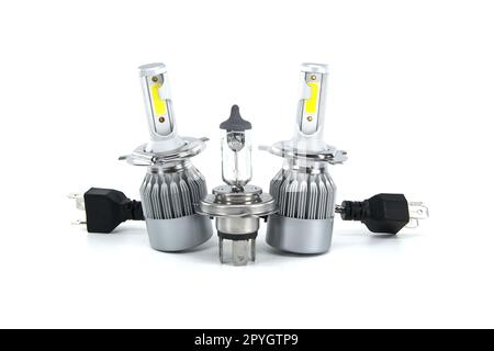 H4 halogen lamp and LED headlight bulbs on white Stock Photo