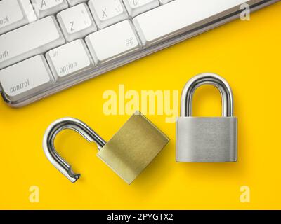Computer security concept. Unlocked padlock on laptop keyboard. Stock Photo