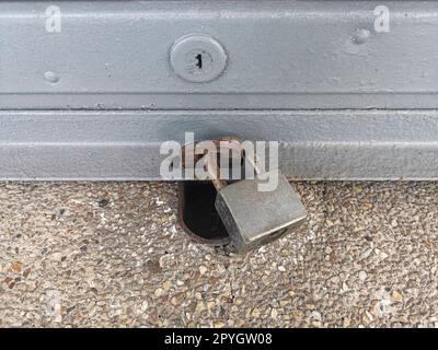 Old padlock. lock on iron door Stock Photo