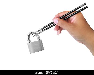 new idea concept male hand with chopsticks holds locked Silver Padlock on a white background Stock Photo