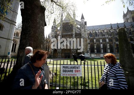 London England, 03/05/2023, People walk past The Westminster Abbey ahead of the coronation on May 3 2023 in London England, UK. On May 6 thousands form around the world are expected to line the traditional but abbreviated route between Buckingham Place and Westminster Abbey during the Coronation of King Charles III and Queen Camilla (Photo by John Lamparski/NurPhoto) Credit: NurPhoto SRL/Alamy Live News Stock Photo